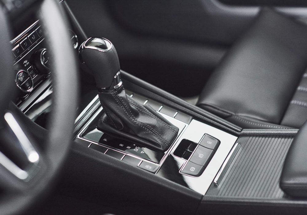 Detail of modern car interior, gear stick, automatic transmission in expensive car
